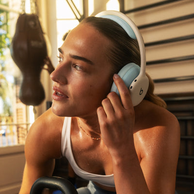 Person wearing Beats 360 headphones in Cloud 
